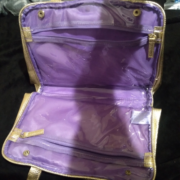 ⭐️ Gold tone makeup bag with purple on inside - Picture 4 of 5